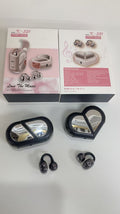 Wireless Gaming Bluetooth Earphones with glossy black and silver earbuds and heart-shaped charging cases, shown with pink retail packaging