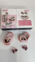 Wireless Gaming Bluetooth Earphones in glossy pink plastic, with rose-gold charging cases and matching metallic earbuds